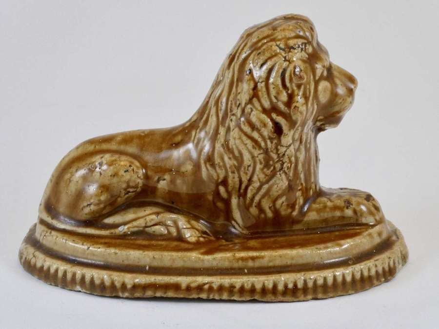 Early 19th Century Treacle Glazed Lion Figure